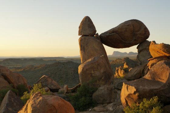 Balanced Rock with the Chisos framed inside.